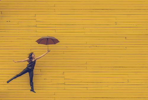 girl holding umbrella